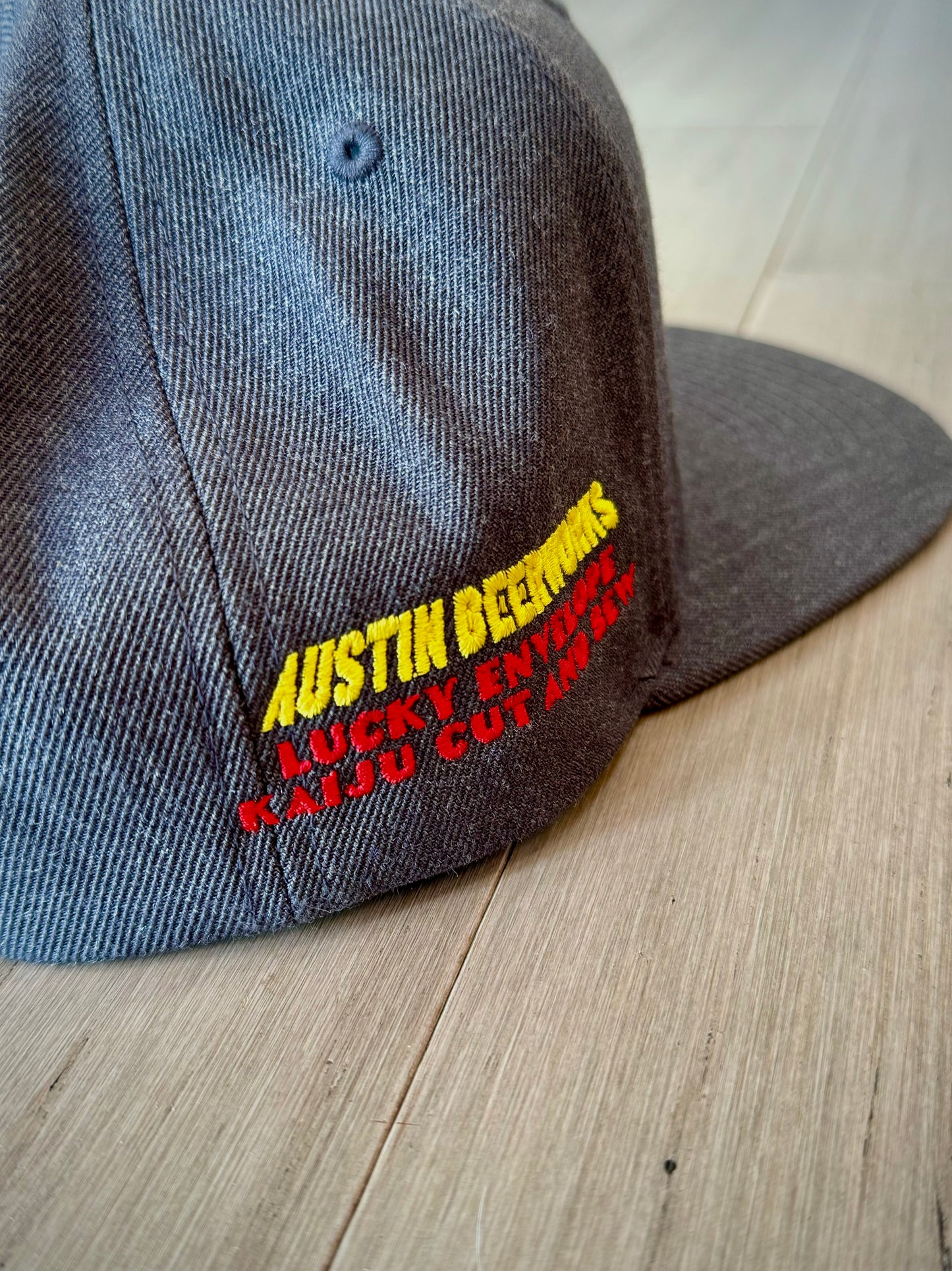 Kaiju Cut and Sew “Power & Elegance” Premium Heather Snapback Cap | Made in Austin, TX
