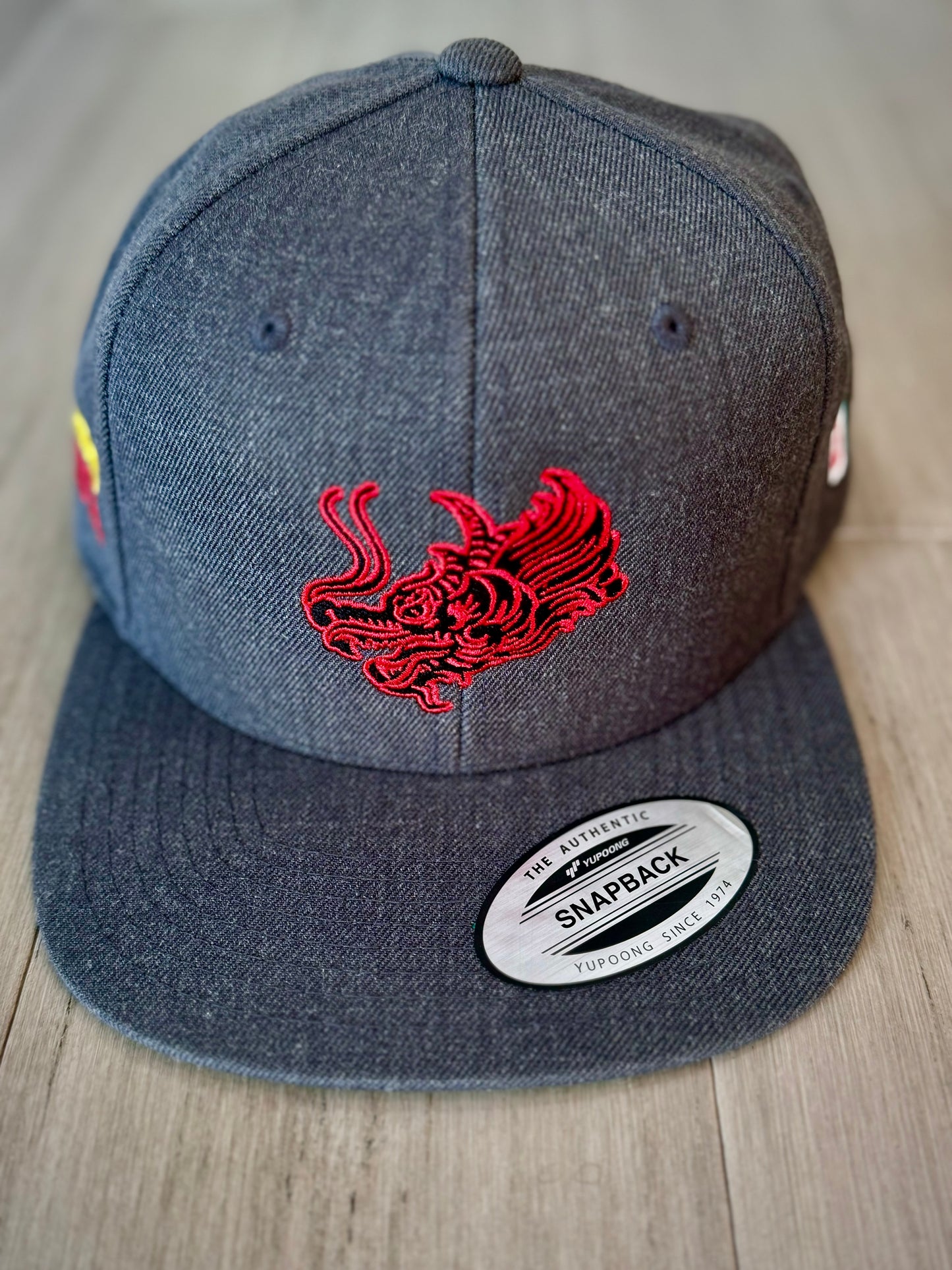 Kaiju Cut and Sew “Power & Elegance” Premium Heather Snapback Cap | Made in Austin, TX