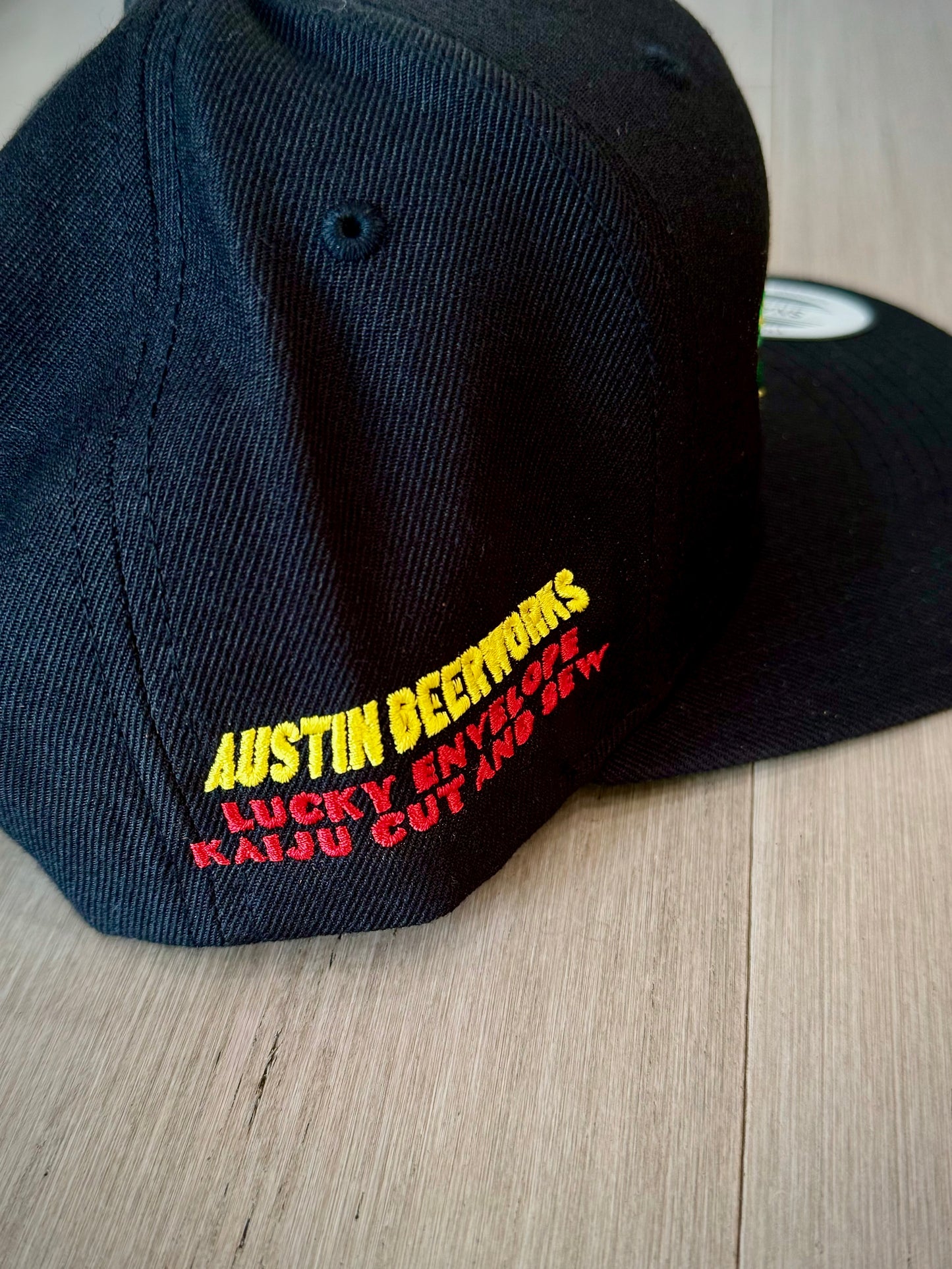 Kaiju Cut and Sew “Power & Elegance” Black Snapback Cap | Made in Austin, TX